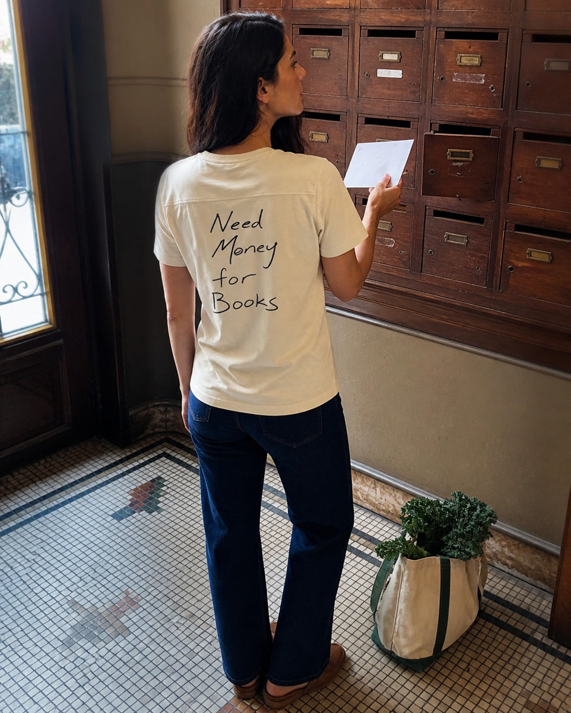 Need Money for Books – Classic T-Shirt in Natural Raw – authentisches iPhone-Lifestylebild